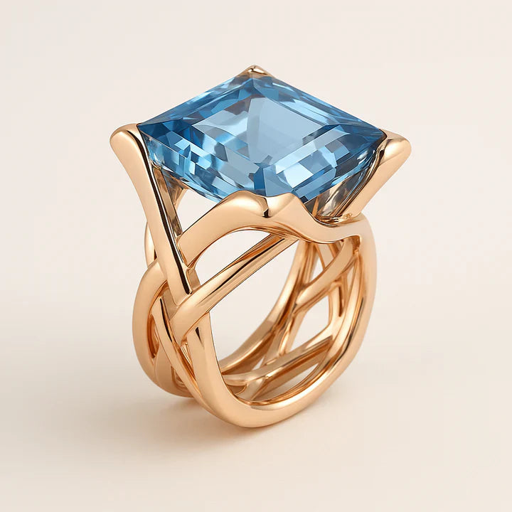 Anillo vintage rosa con circonita azul